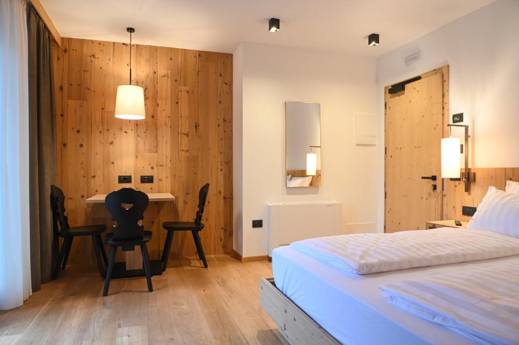 Postel nebo postele na pokoji v ubytování B&B Fontanella