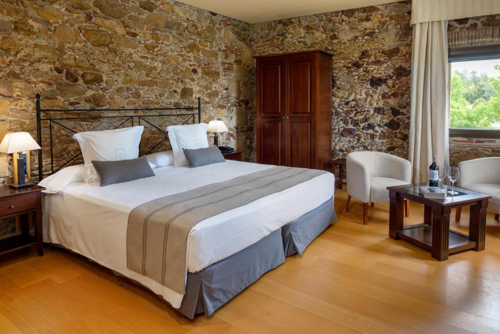 Postel nebo postele na pokoji v ubytování Es Portal Restaurant i Hotel Boutique - Adults only