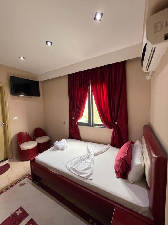 Postel nebo postele na pokoji v ubytování Hotel Selfo