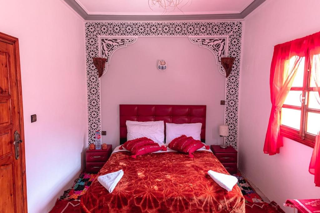 Postel nebo postele na pokoji v ubytování Amazigh Family Riad