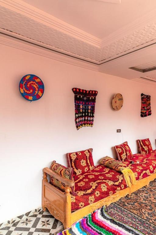 Postel nebo postele na pokoji v ubytování Amazigh Family Riad