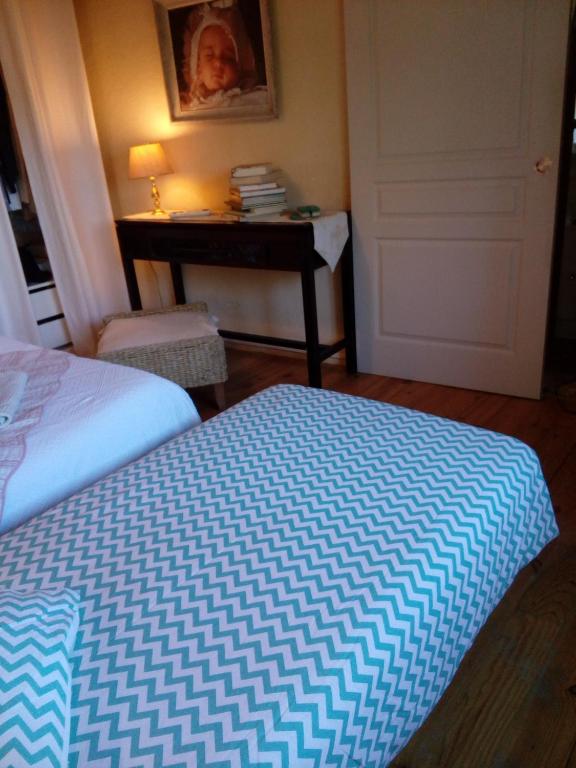 Posteľ alebo postele v izbe v ubytovaní Comfortable Quiet House in the countryside Porte-du-Quercy for 8 people