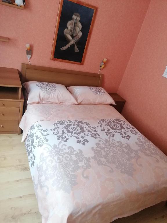 Postel nebo postele na pokoji v ubytování APARTMAJI VALTER