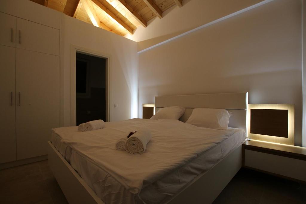 Postel nebo postele na pokoji v ubytování Sunset Sea View Villa 8