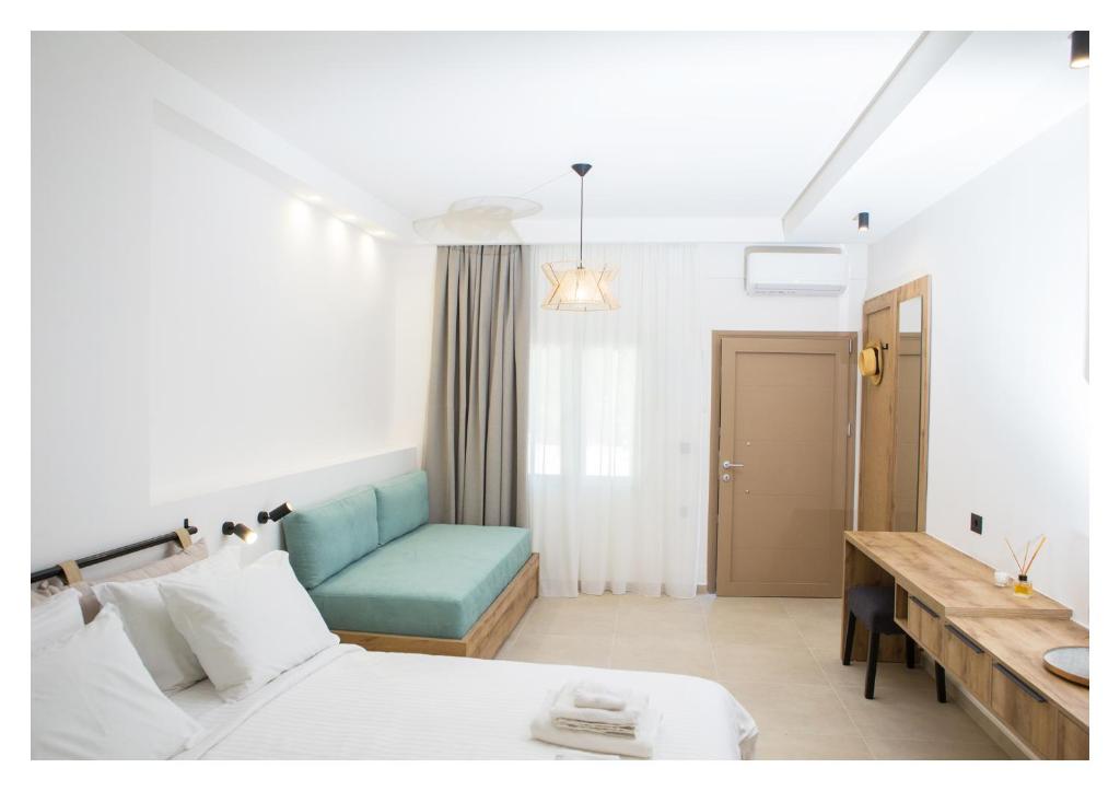 Postel nebo postele na pokoji v ubytování Le Quartier Comfy Studios