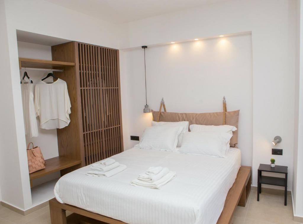 Postel nebo postele na pokoji v ubytování Le Quartier Comfy Studios