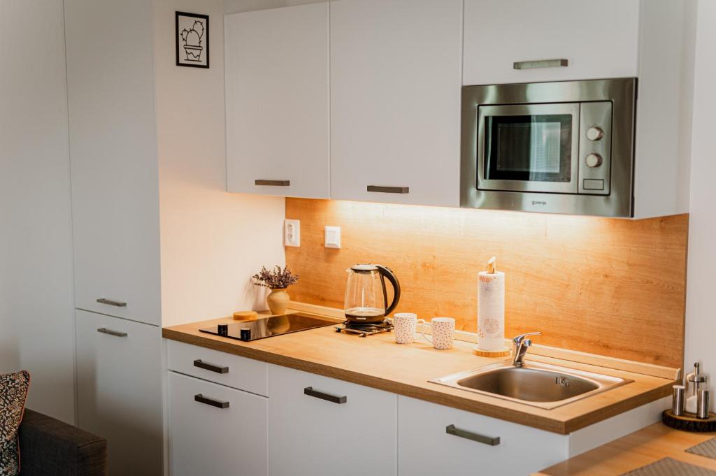 Kuchyň nebo kuchyňský kout v ubytování Vila ZUBEREC/ Apartmán č. 204