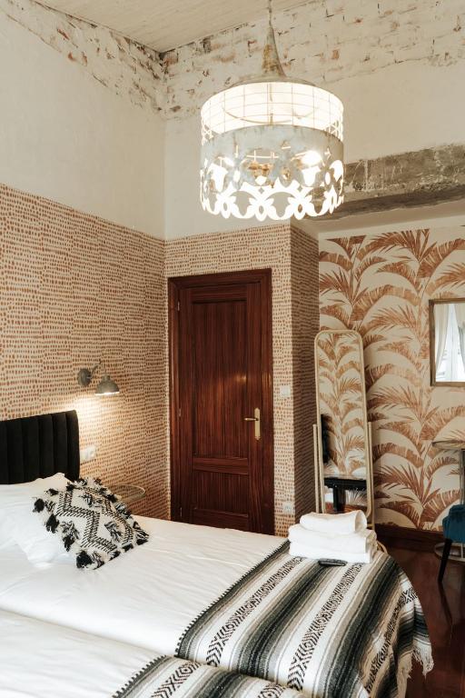 Postel nebo postele na pokoji v ubytování Casa Real 110+2