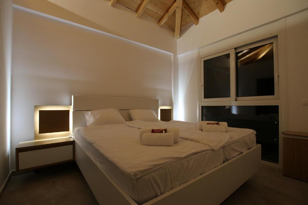 Postel nebo postele na pokoji v ubytování Sunset Sea View Villa 9