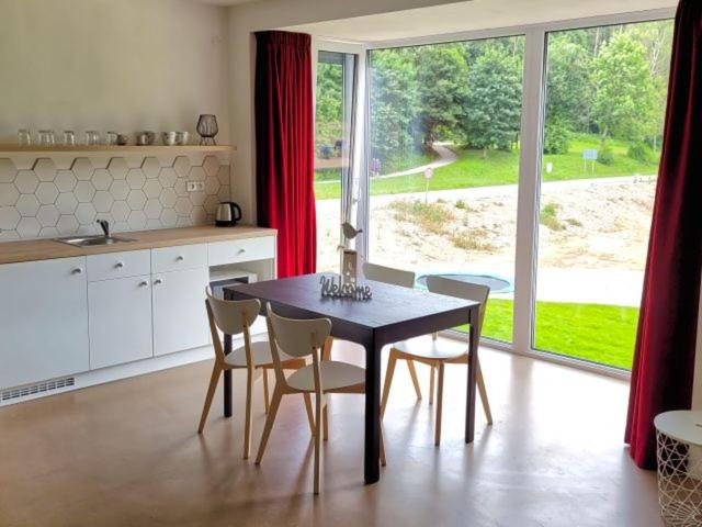 Kuchyň nebo kuchyňský kout v ubytování Apartmány U Jeskyní