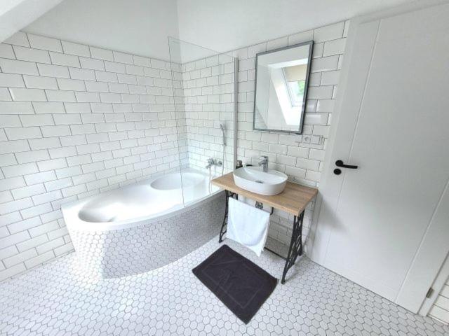 Koupelna v ubytování Apartmány U Jeskyní