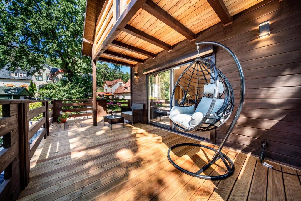 Patio alebo iná vonkajšia časť ubytovania Domki Miśków