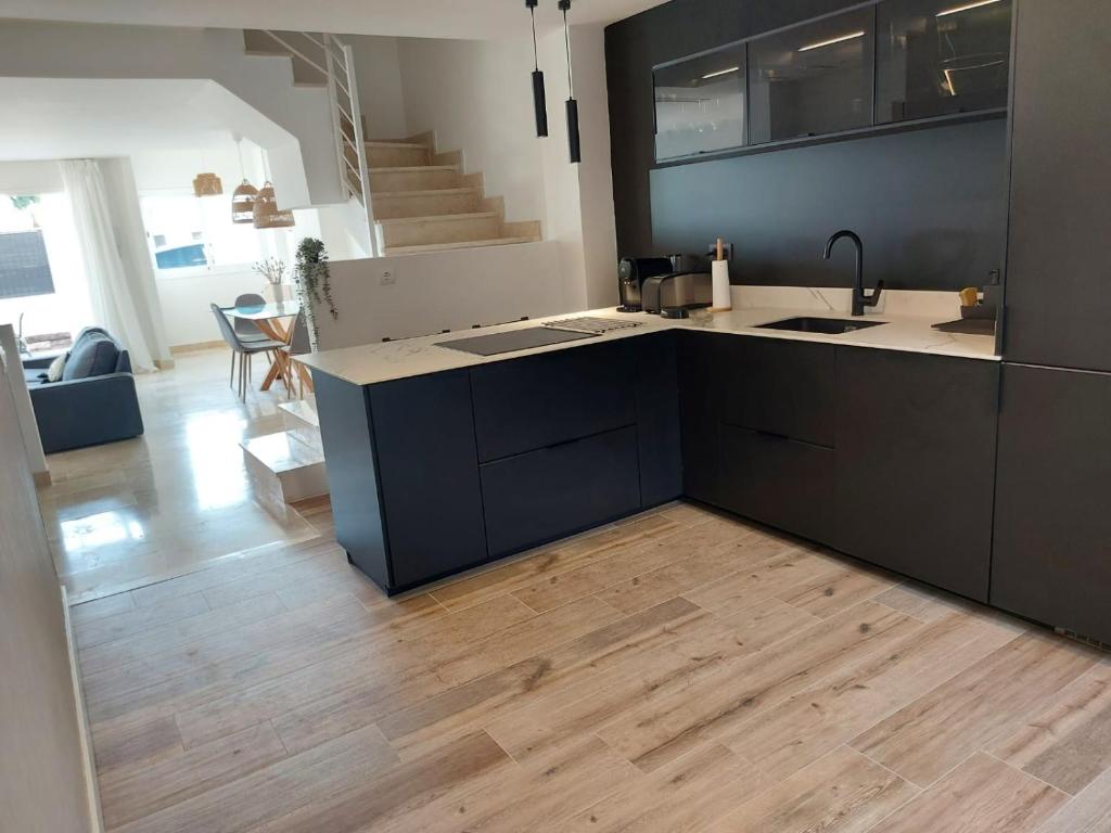 Kuchyň nebo kuchyňský kout v ubytování Vivienda adosada agradable y cómoda cerca del mar