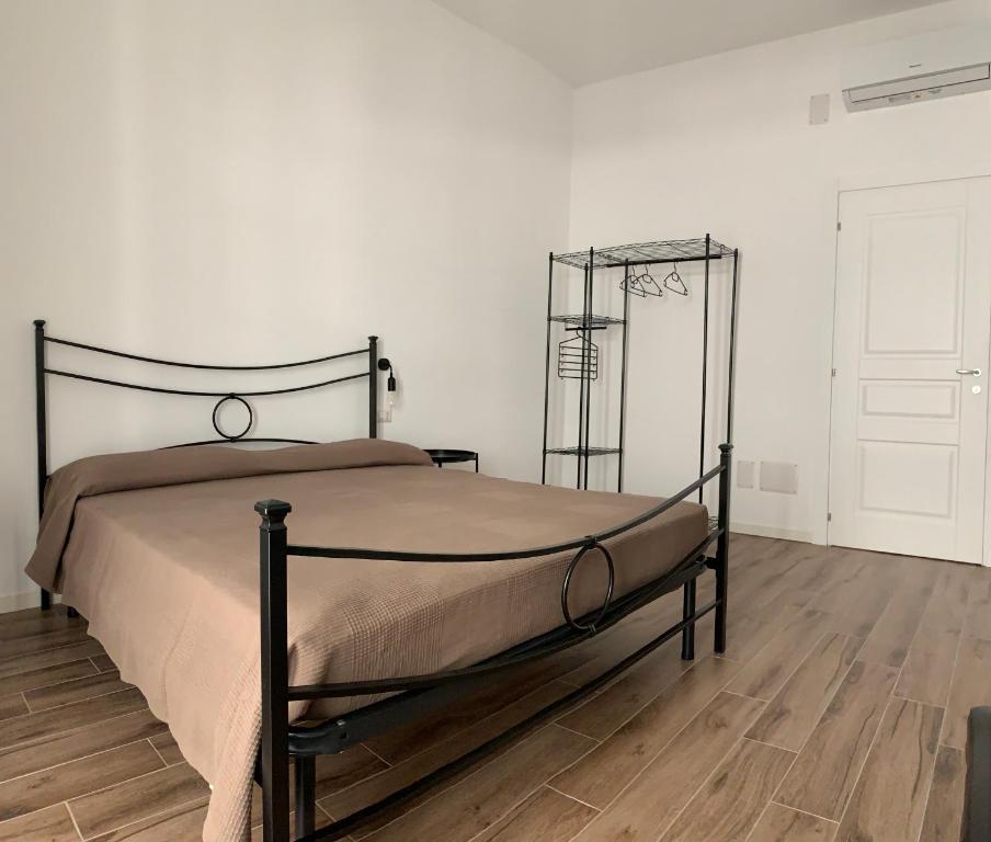 Postel nebo postele na pokoji v ubytování Latomia del Paradiso chambres et vacances