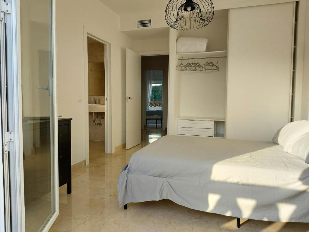 Postel nebo postele na pokoji v ubytování Vivienda adosada agradable y cómoda cerca del mar