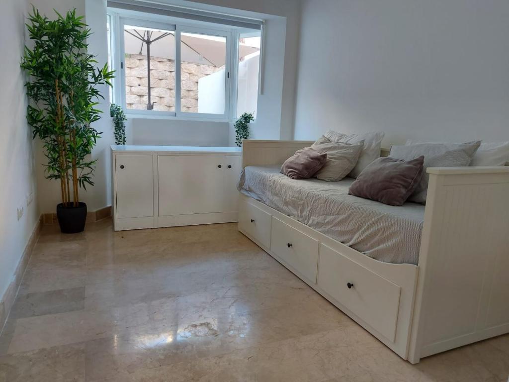 Postel nebo postele na pokoji v ubytování Vivienda adosada agradable y cómoda cerca del mar