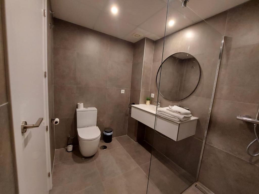 Koupelna v ubytování Vivienda adosada agradable y cómoda cerca del mar