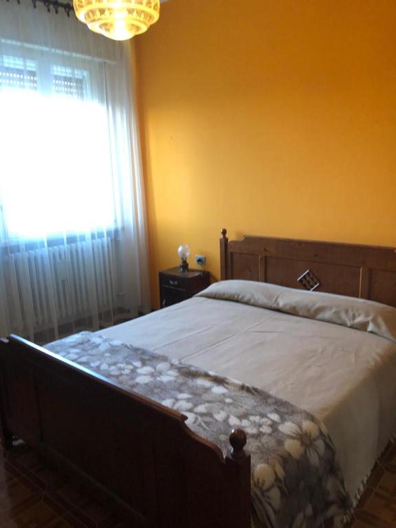 A bed or beds in a room at Ardiano 1818