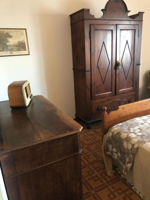 A bed or beds in a room at Ardiano 1818