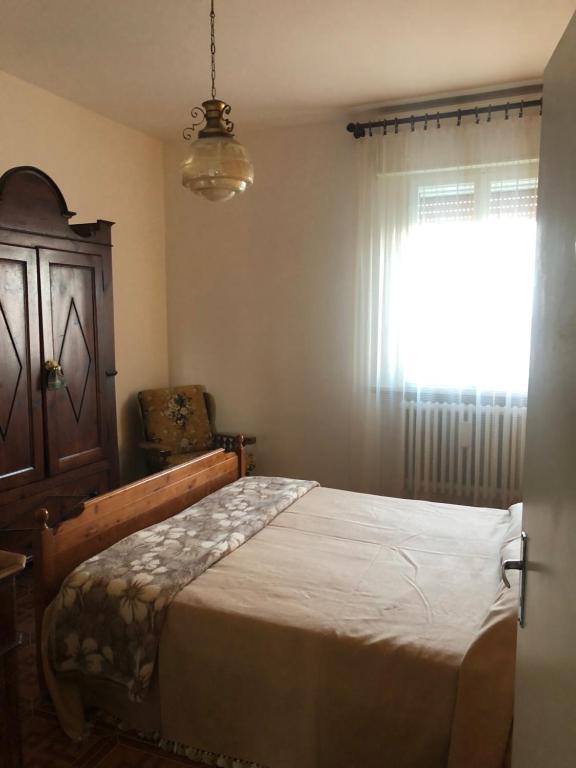A bed or beds in a room at Ardiano 1818