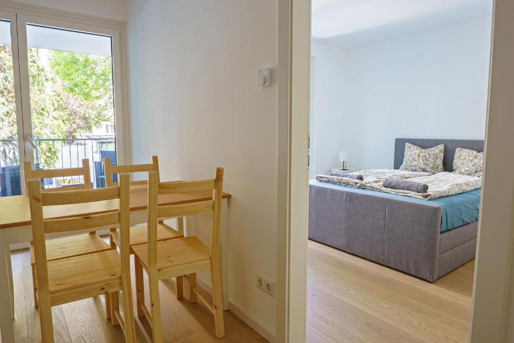 Posteľ alebo postele v izbe v ubytovaní Vienna City Apartments 1140 Vienna