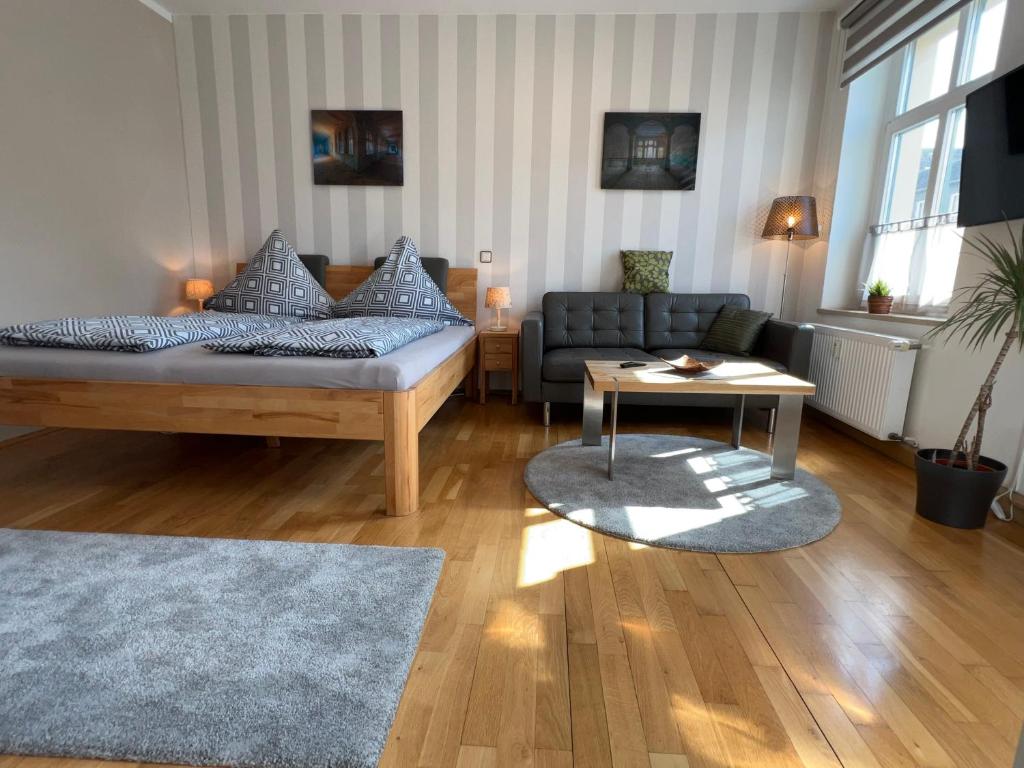 Postel nebo postele na pokoji v ubytování Pension-Leipzig-Süd
