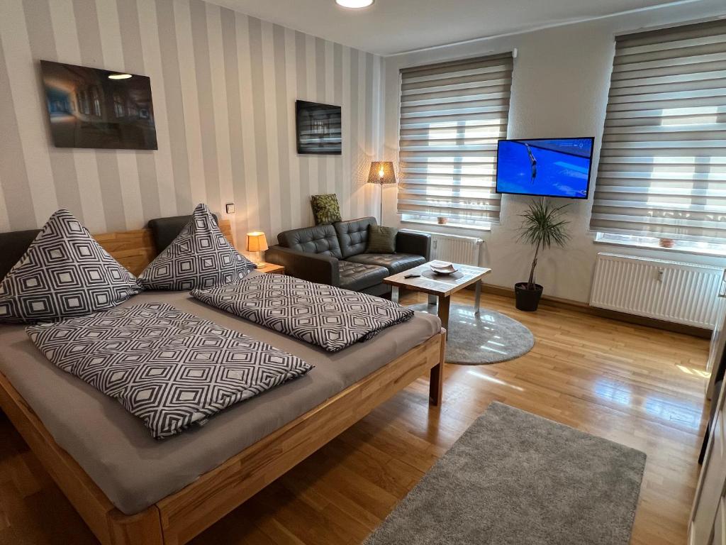 TV a/nebo společenská místnost v ubytování Pension-Leipzig-Süd