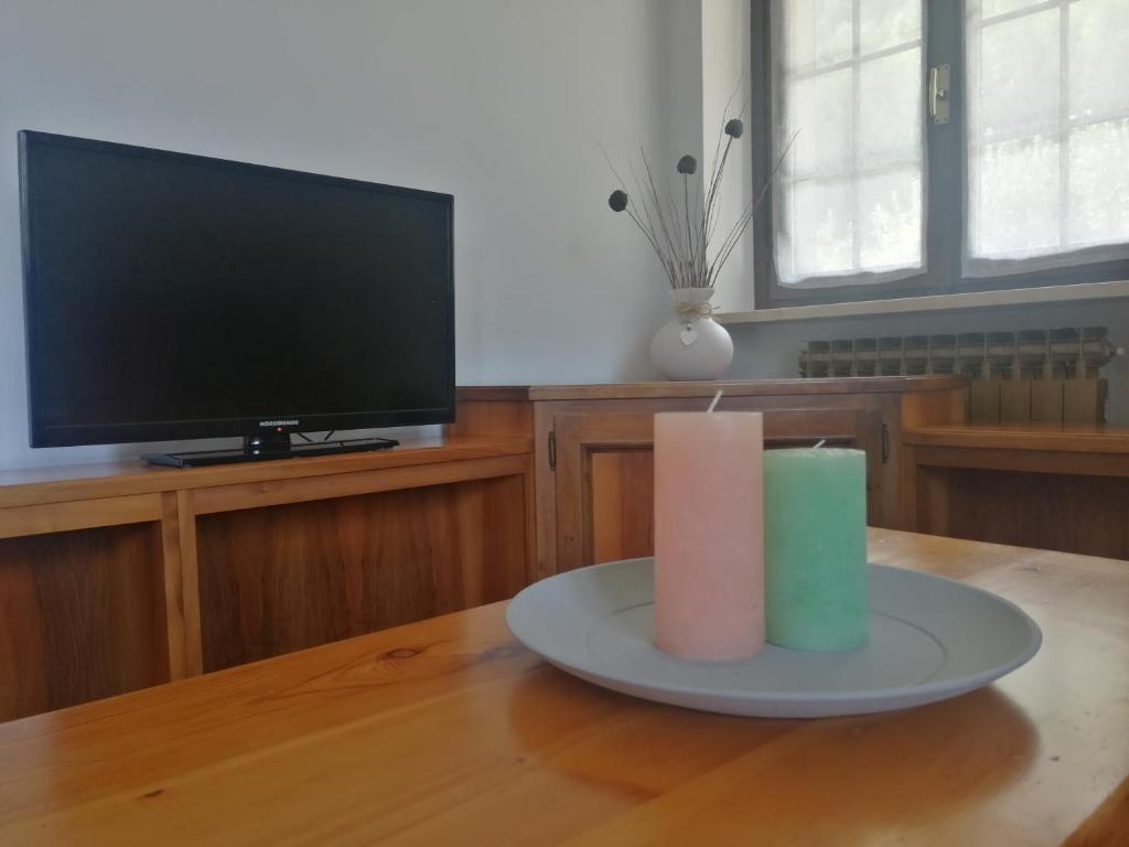 TV a/nebo společenská místnost v ubytování MAISON BLANC
