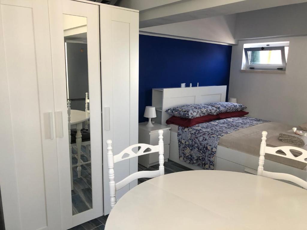 Postel nebo postele na pokoji v ubytování Solidea House
