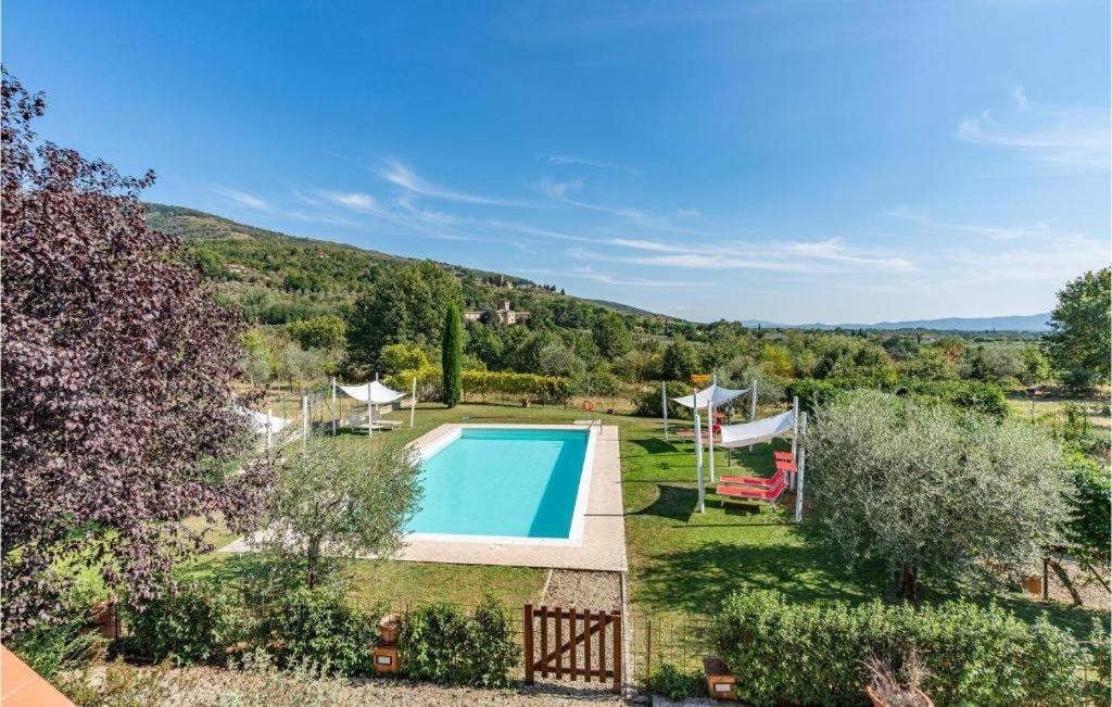 an image of a villa with a swimming pool at Casa Macinarino 13 in Loro Ciuffenna