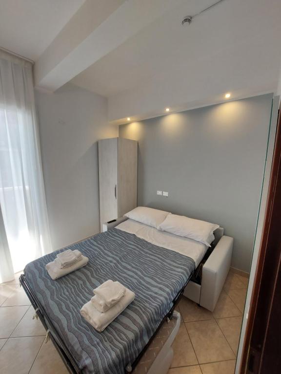 Postel nebo postele na pokoji v ubytování Hotel Caravel Park