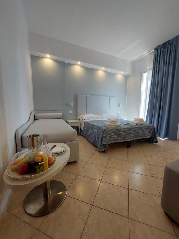 Postel nebo postele na pokoji v ubytování Hotel Caravel Park