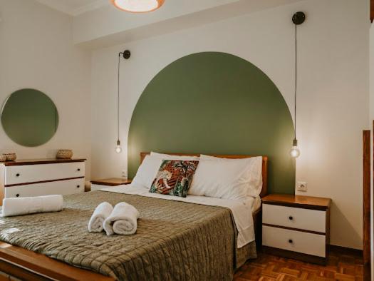 Posteľ alebo postele v izbe v ubytovaní Corfu Town SUNSHINE Apartment