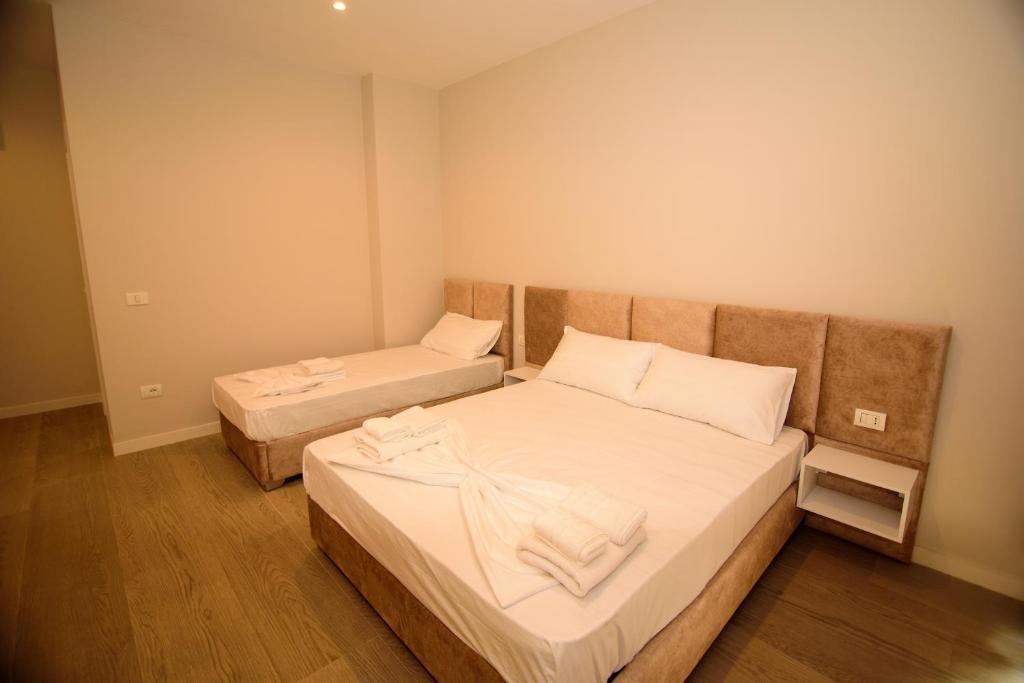 Postel nebo postele na pokoji v ubytování Solea Hotel