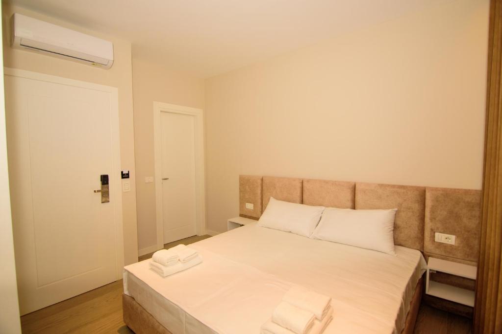 Postel nebo postele na pokoji v ubytování Solea Hotel