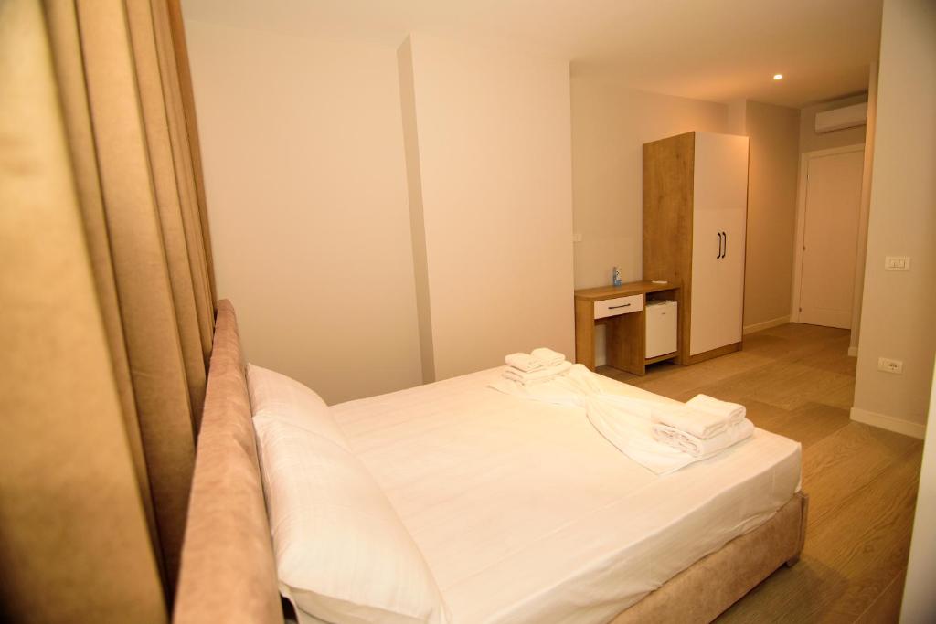 Postel nebo postele na pokoji v ubytování Solea Hotel