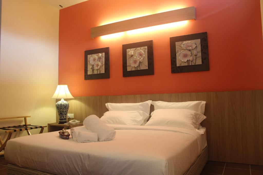 Postel nebo postele na pokoji v ubytování Fomecs Boutique Hotel, Jonker Street