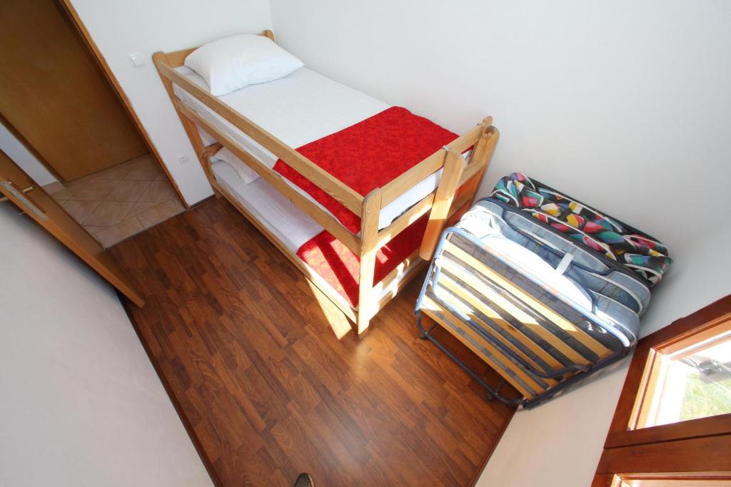 Postel nebo postele na pokoji v ubytování Apartment Bibinje 4197b