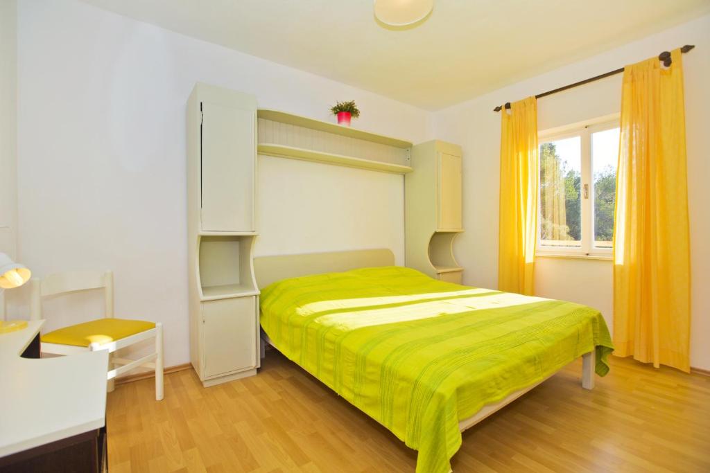 Posteľ alebo postele v izbe v ubytovaní Seaside secluded apartments Cove Tvrdni Dolac, Hvar - 4008