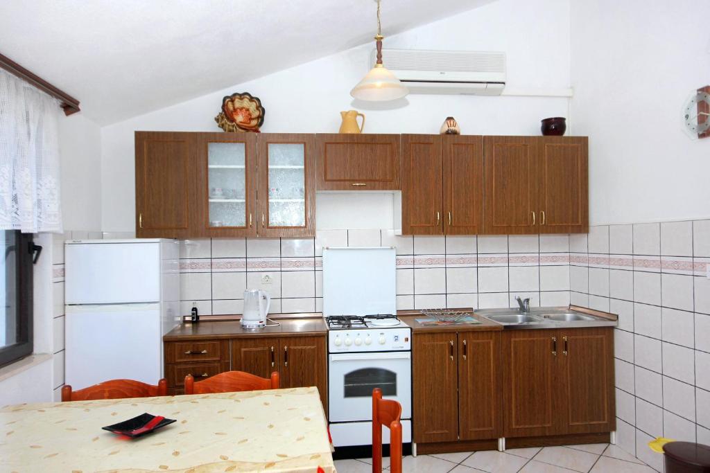 Fotografie z fotogalerie ubytování Apartments by the sea Slatine, Ciovo - 2039 v destinaci Slatine