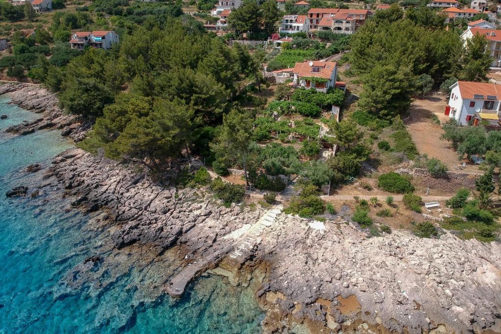 an aerial view of a rocky island in the ocean at Studio Zavala 2061a in Zavala