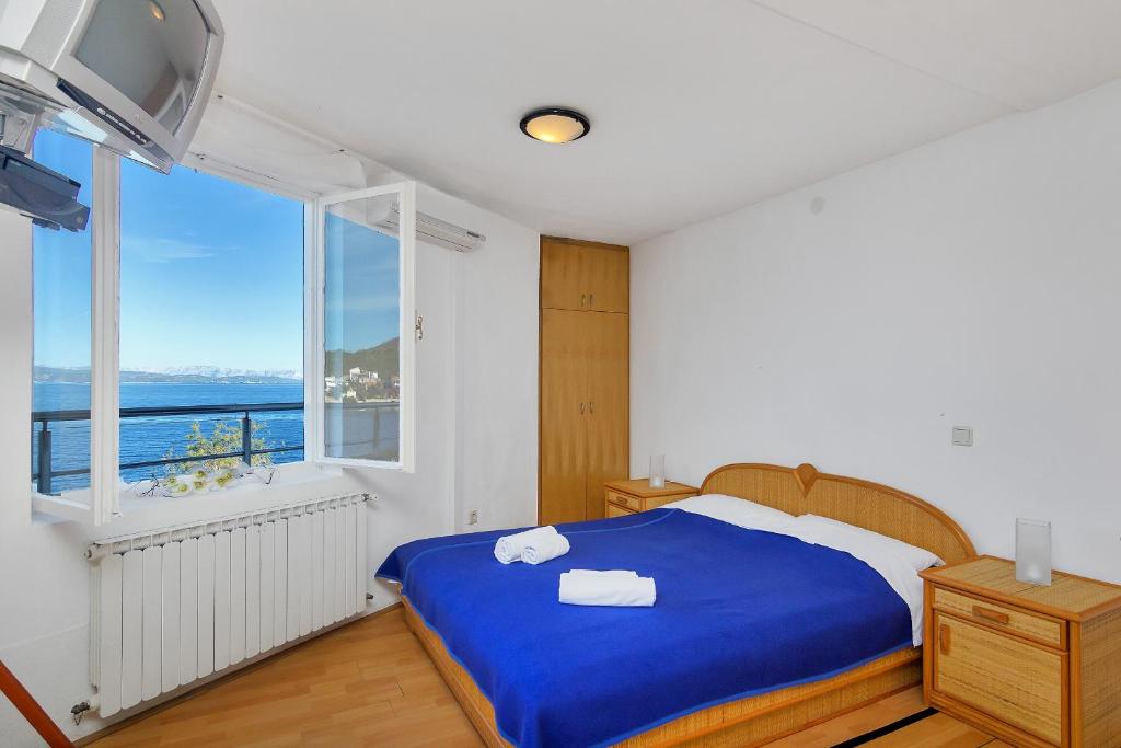 Posteľ alebo postele v izbe v ubytovaní Rooms by the sea Cove Pokrivenik, Hvar - 2069