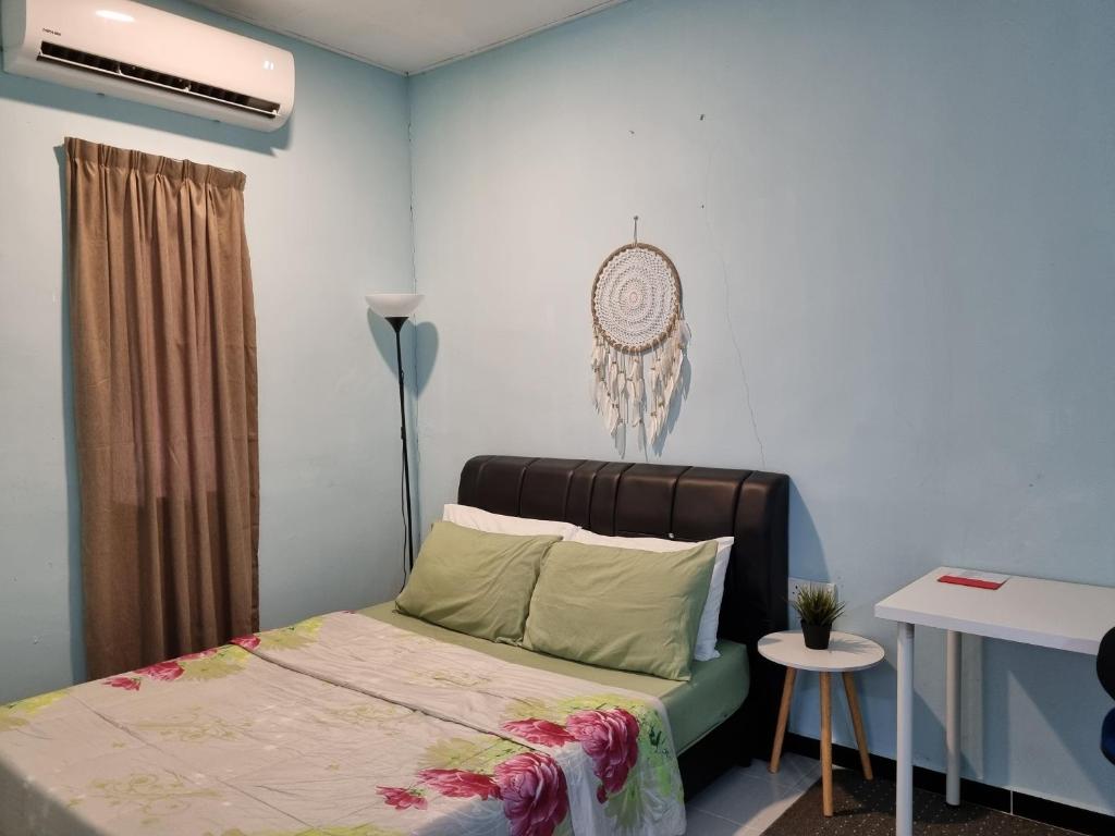 Postel nebo postele na pokoji v ubytování Seven Stones Langkawi