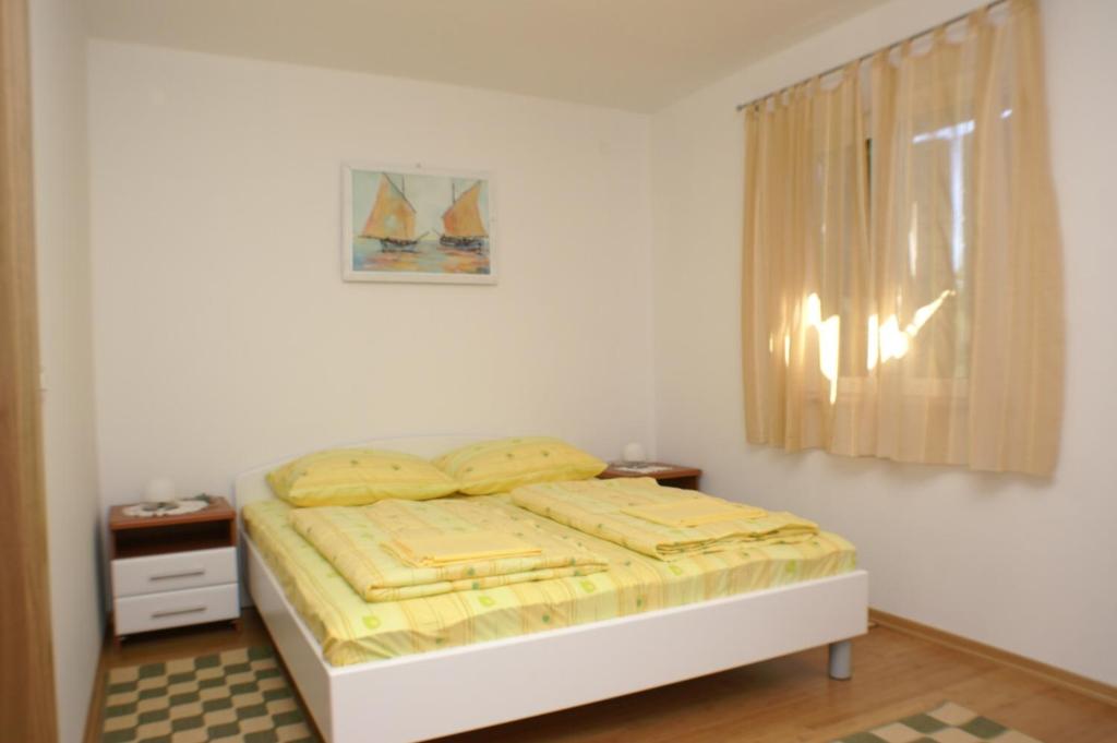 Posteľ alebo postele v izbe v ubytovaní Apartments by the sea Supetar, Brac - 4274