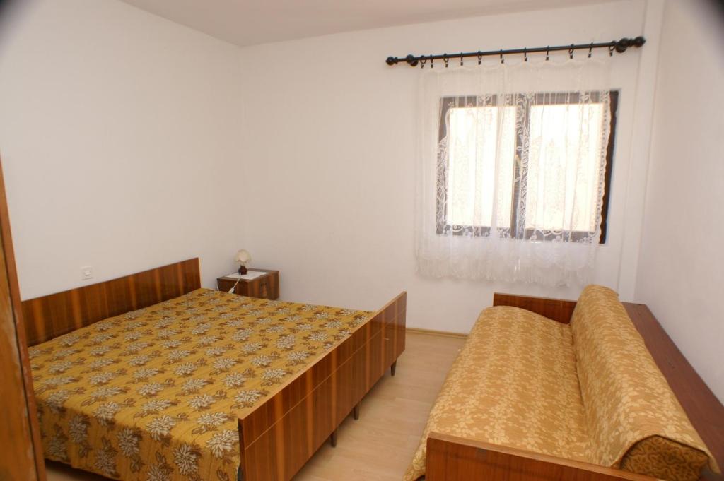 Posteľ alebo postele v izbe v ubytovaní Apartments and rooms by the sea Zubovici, Pag - 4065