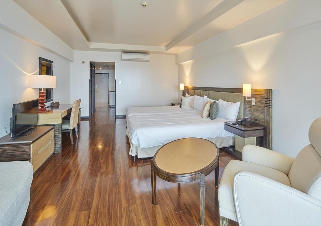 Postel nebo postele na pokoji v ubytování Hotel Mahaina Wellness Resorts Okinawa
