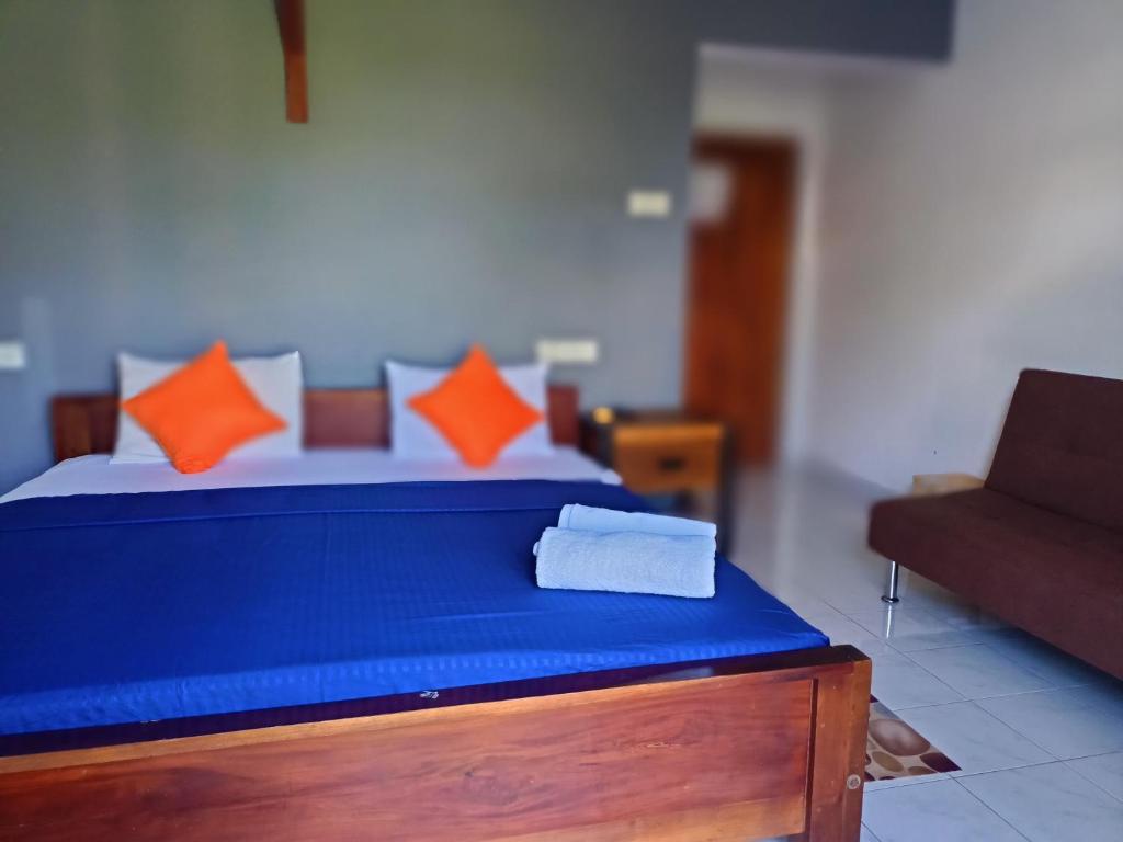 Postel nebo postele na pokoji v ubytování Andorra Tourist Resort Anuradhapura