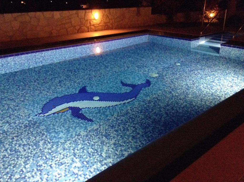 Bazén v ubytování Villa Harriet Maria with pool and ocean view Kolimbari, Chania nebo v jeho okolí