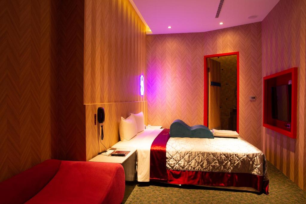 Postel nebo postele na pokoji v ubytování You Want Motel