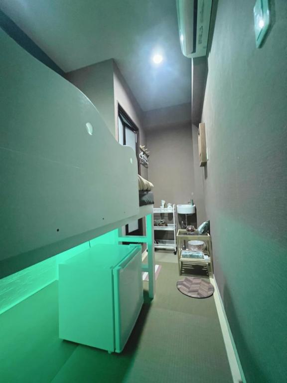 TV a/nebo společenská místnost v ubytování 誠家　MAKOTO HOSTEL
